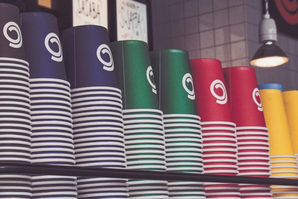 black and red cylindrical containers