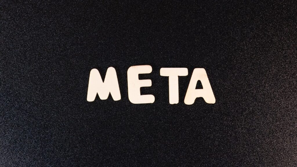 a close up of a black surface with white letters