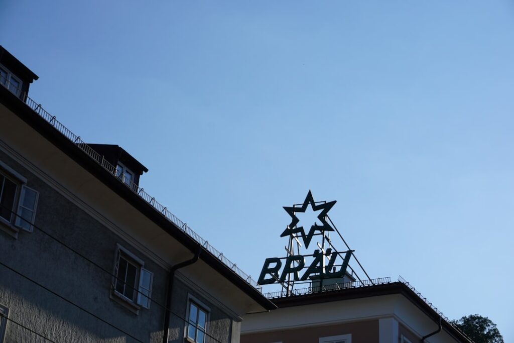 Building with "brau" sign and star