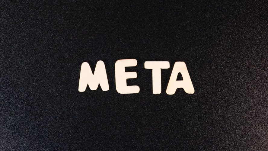 a close up of a black surface with white letters