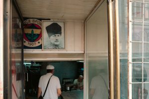 Entrance with portraits and club logo above