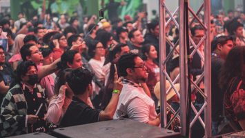 A crowd of people watching an event